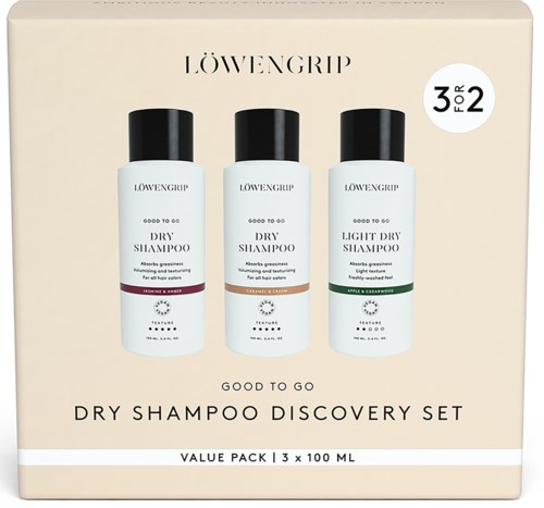 Set of three small shampoo bottles labeled for dry, light dry, and meant for travel use.