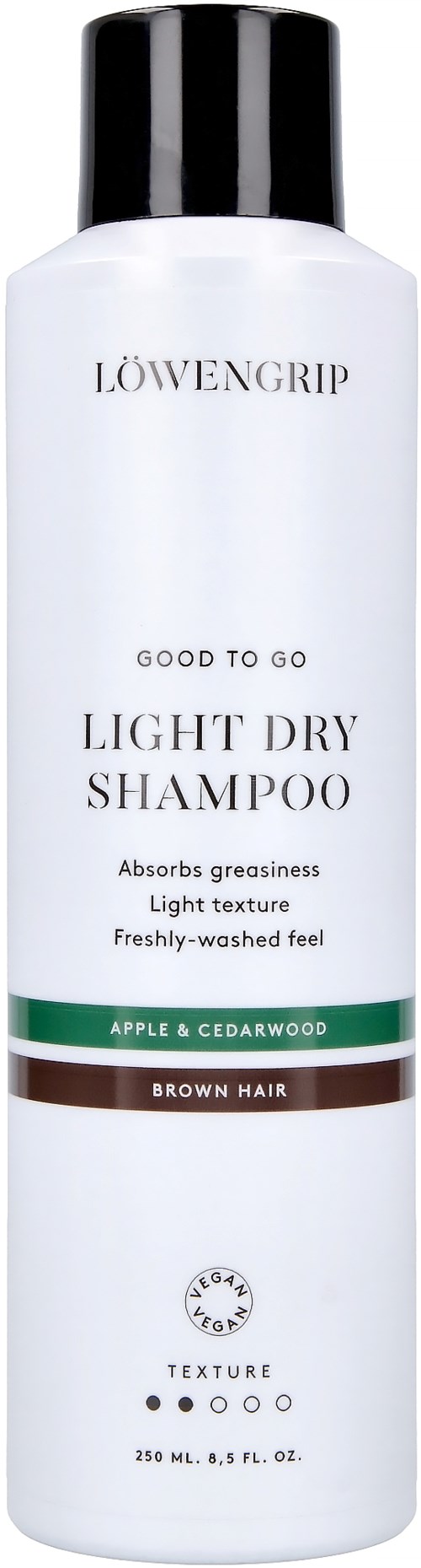 Eine weiße Flasche mit schwarzem Deckel, beschriftet 'LÖWENGRIP LIGHT DRY SHAMPOO' für braunes Haar, mit Apfel, Zedernholz und Texturoptionen.