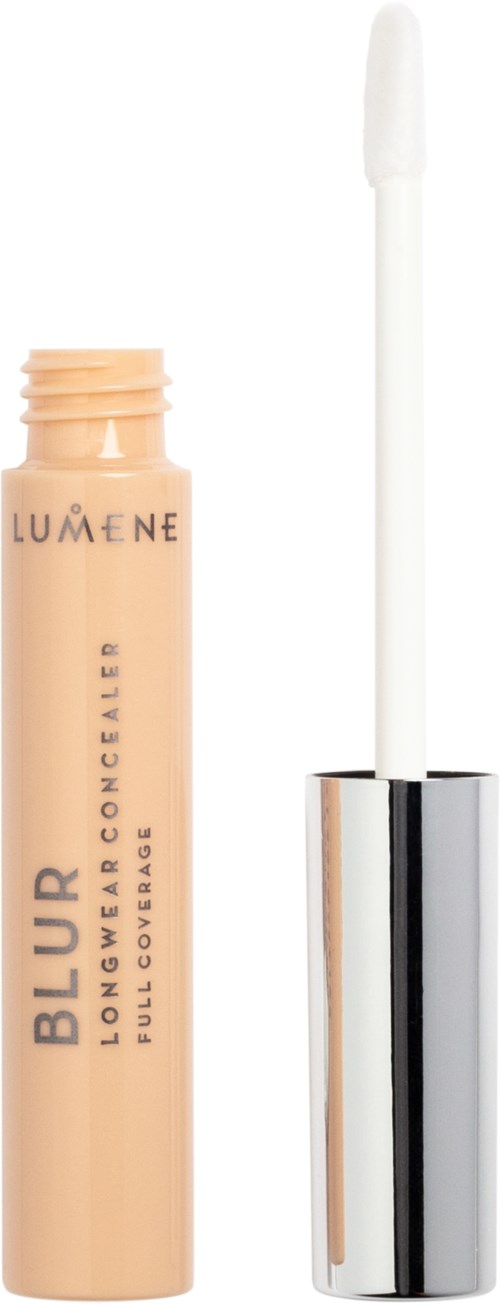 Een beige vloeibare concealer tube met een witte applicator en zilveren dop.