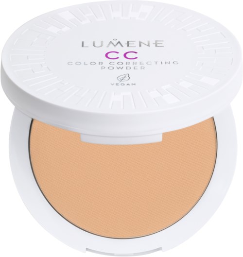 A round white compact with beige powder inside, labeled Lumene CC color correcting powder, vegan.
