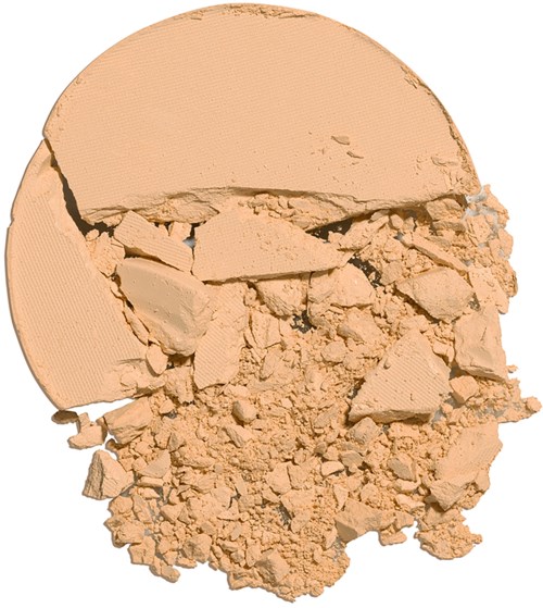 Broken beige powder, looks like makeup or face powder, with larger chunks and fine dust.