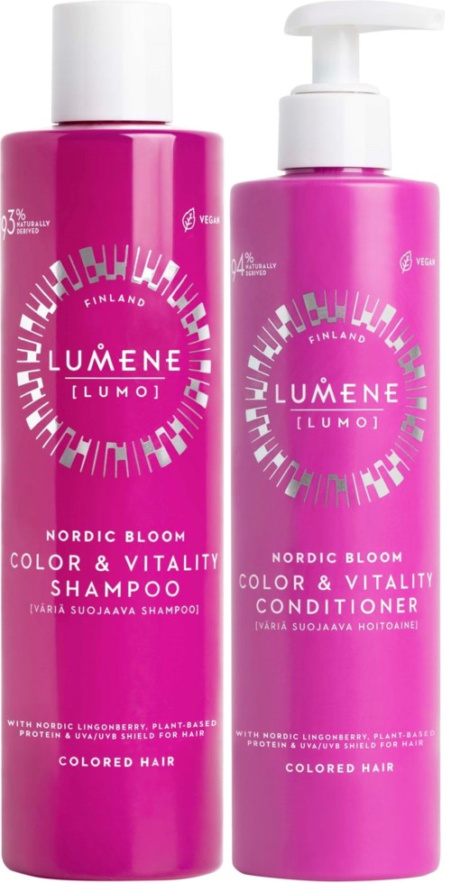 Twee roze flessen, een is shampoo en de andere conditioner, voor gekleurd haar met Nordic bloom geur.