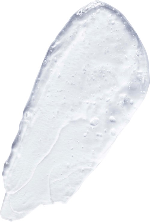 Een applicator met een witte, crèmekleurige substantie, mogelijk lotion of crème. Het is gelijkmatig verdeeld en soepel.