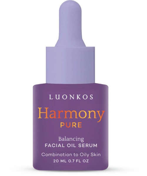 Eine lila Flasche mit Tropfaufsatz, gekennzeichnet als Harmony Pure Gesichtsölserum für ölige Haut.