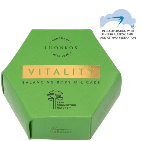 Grüne Hexagon-Box für Vitality ausgleichendes Körperölkuchen mit finnischem Allergie-, Haut- und Asthma-Schutzlogo.