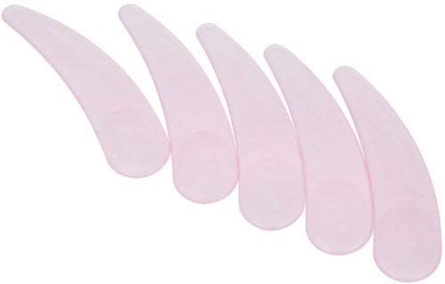 Roze nepwimpers tonen verschillende gebogen en taps toelopende strips, gebruikt om het uiterlijk van de ogen te verbeteren.