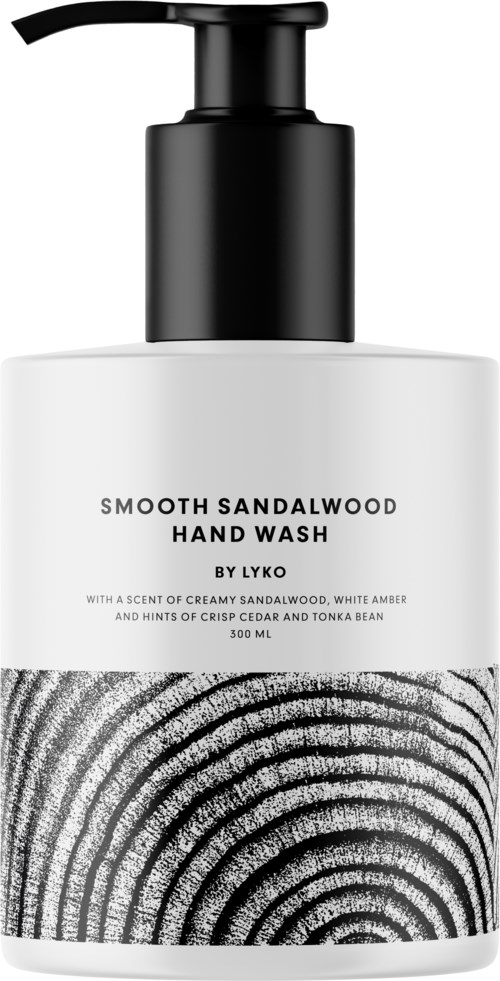 En vit och svart flaska handtvål med sandmönster och etikett som nämner sandalwood doft och 300 ml.