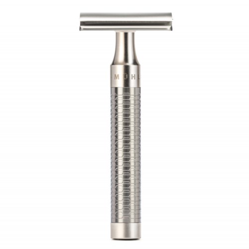A silver safety razor with a textured handle and three blades at the top.