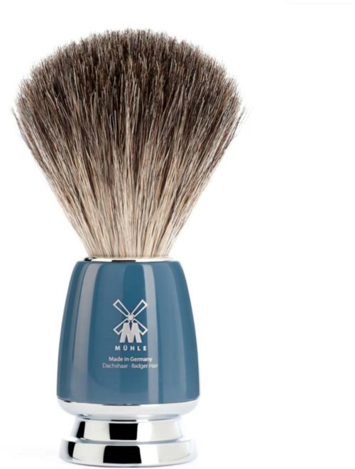 A shaving brush with a blue handle and natural bristles, standing upright against a white background.