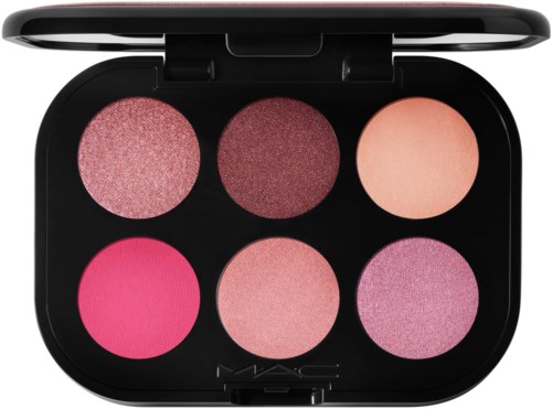 En makeup-palett med sex rosa och röda nyanser i cirkelformade fack i ett svart fodral.