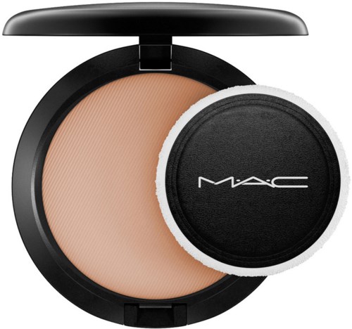 A makeup compact with beige powder and a round applicator with the MAC logo.