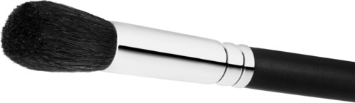 A makeup brush with a black handle and soft bristles, close-up on a plain background.
