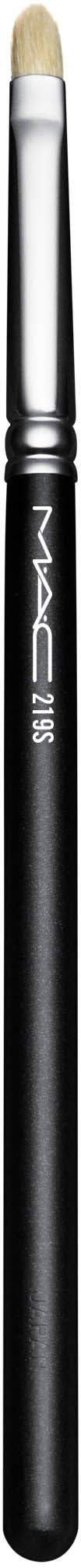 A makeup brush with a black handle and cream-colored tip standing vertically against a dark background.