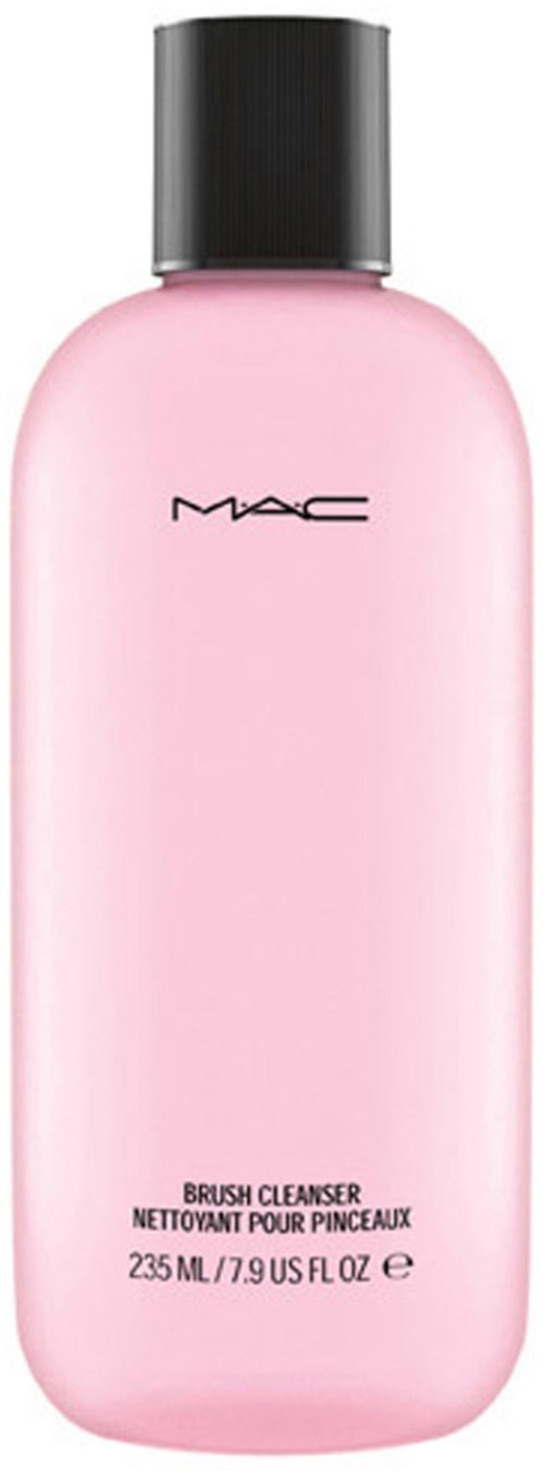 Eine pinke MAC-Flasche mit Reinigungsseife, schwarzer Kappe, mit Produktname und Details.