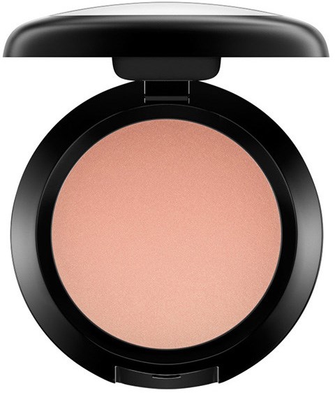 A round makeup compact open, showing peach-colored powder inside. Black case with a hinge. Simple and clean design.