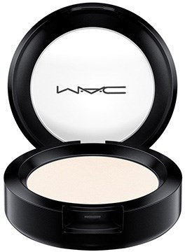 MAC logo inside an open black makeup compact with light-colored powder.