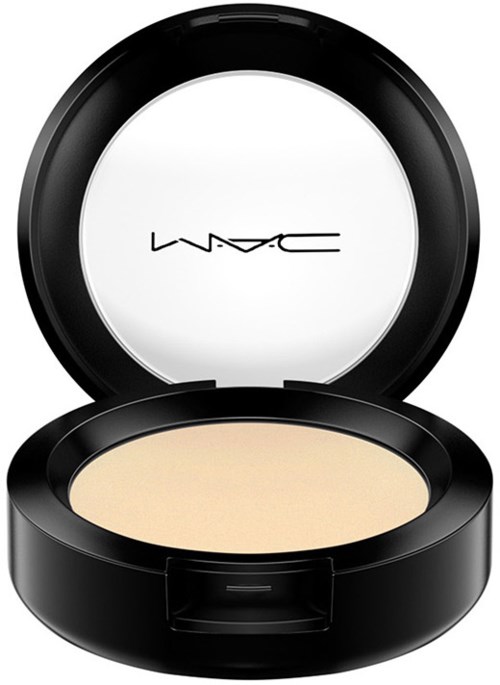 A compact makeup powder container with a mirror inside the lid and MAC logo inside.