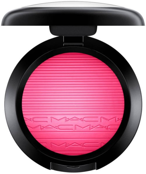 A round makeup blush with a black case and bright pink product inside. The brand name MAC is embossed on the blush.