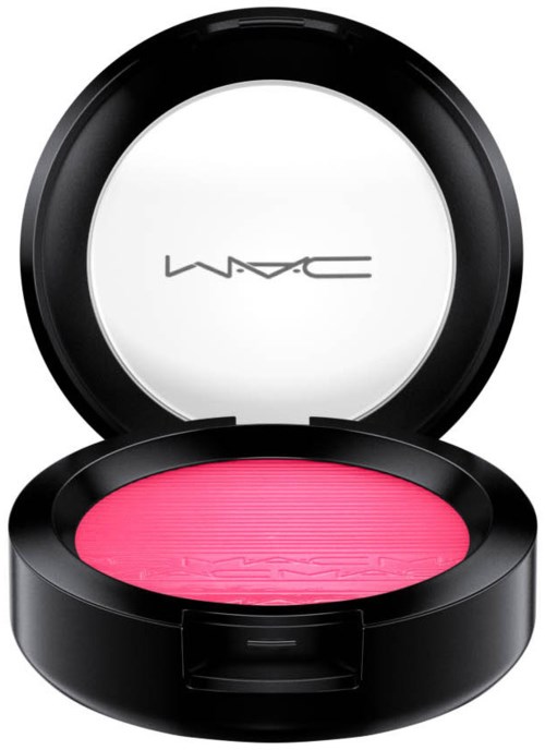 A round black makeup container with pink blush inside and MAC logo on the lid.