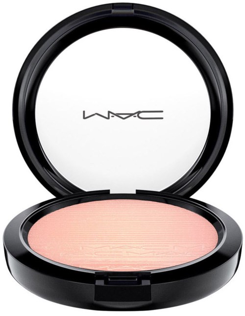 A round makeup compact with light pink powder, black case, and the MAC logo inside the lid.