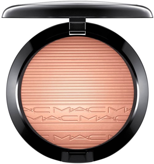 A round blush in black packaging with horizontal lines and MAC logo embossed on the surface.