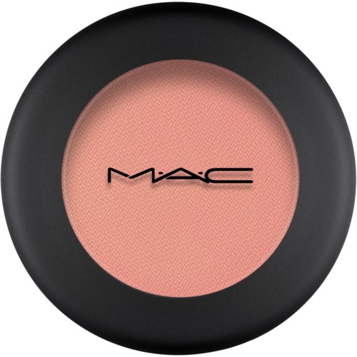 A round makeup blush with a black border and MAC logo in the center.