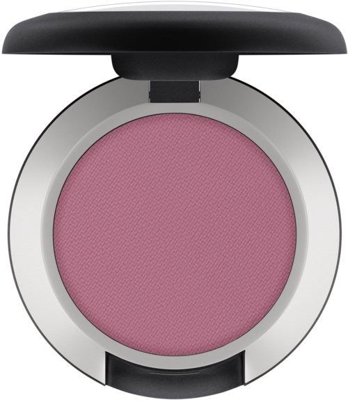 A pink blush or eyeshadow in a round compact with a black lid, shown from above.