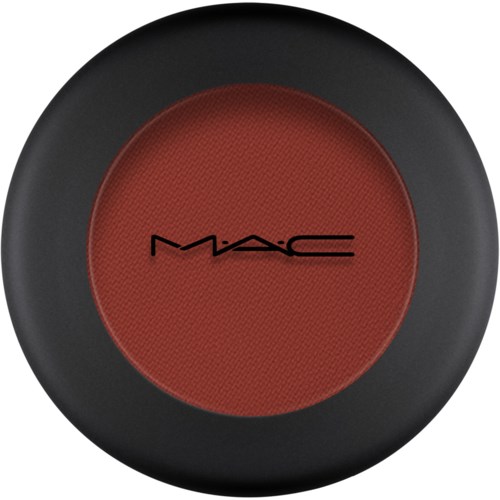 A red blush compact with a black outer case and MAC logo in the center.