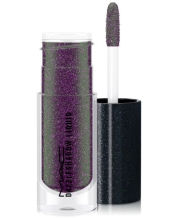 Glittrig lila läppstift med applikator, i genomskinlig tub och svart lock, för läpparna.