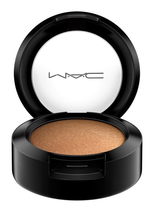 A round, brown eyeshadow in a black compact case with a clear lid showing MAC logo.