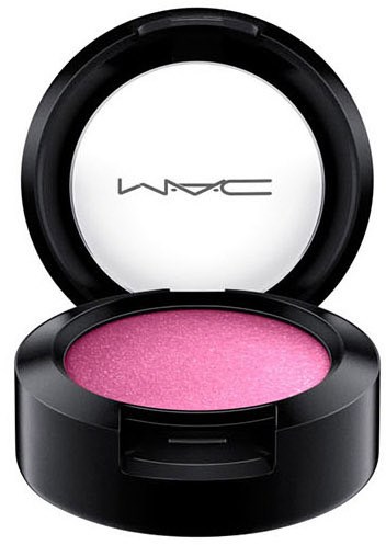 Ett runt svart container med rosa glitter make-up, öppet lock, MAC-logga inuti locket.
