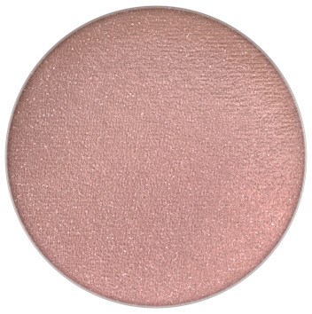 A round makeup product, light pink with shimmering, smooth surface.