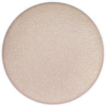 A round, light-colored makeup product with a shimmery, smooth surface. It appears to be a highlighter or eyeshadow.