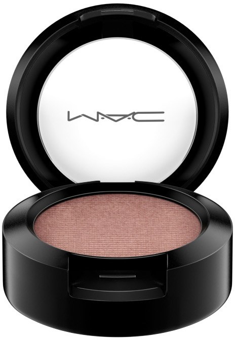 A round black makeup compact with a mirror inside and pinkish powder eyeshadow.