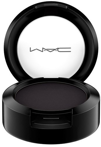 A round black makeup compact with a mirror inside, showing the MAC logo.