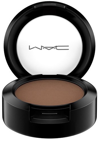 A round makeup container with brown powder inside, and a white lid with the MAC logo.