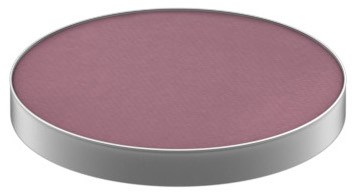 En rund, lila makeup-rouge i ett silverfodral.