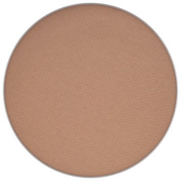 A round, beige-colored makeup compact with pressed powder inside.