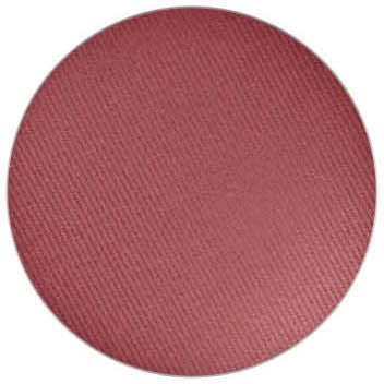En rund, rosa makeuprouge med en strukturerad yta.