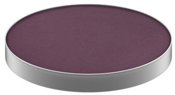 En rund, lila makeup blush med silverkant.