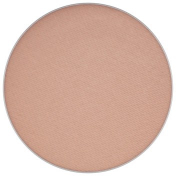 A round compact with beige powder inside, likely for makeup or face powder.
