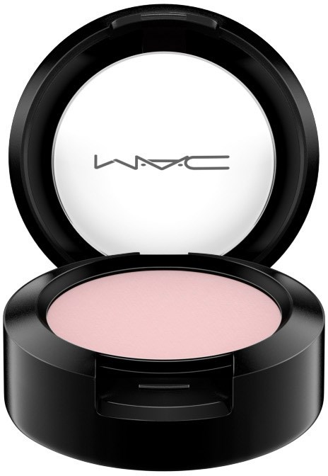 A pink blush or eyeshadow in a round black container with a mirror inside the lid.