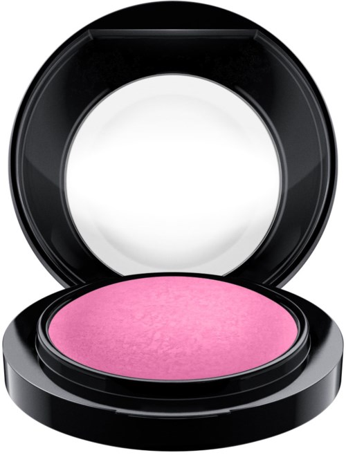 A pink blush with a black compact case and a mirror inside the lid.