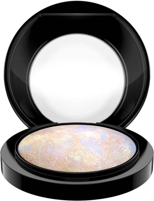 The makeup compact is open, showing shiny, colorful eyeshadow inside with a black round case.