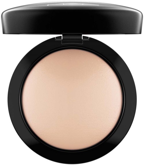 A round compact with pressed powder inside. The case is black with a lid that flips open.