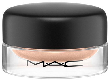 A small container of MAC beige face powder with a black lid and clear bottom.