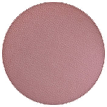 A round pink blush makeup compact with a smooth, matte finish.