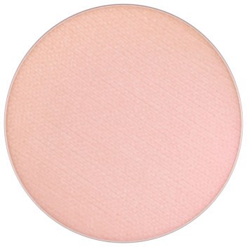 A round, light pink makeup blush or powder with a smooth surface.