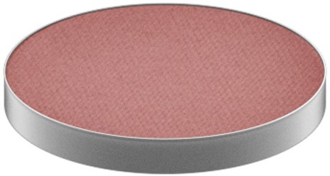 A round, pink makeup blush or eyeshadow palette without any labels or additional design.