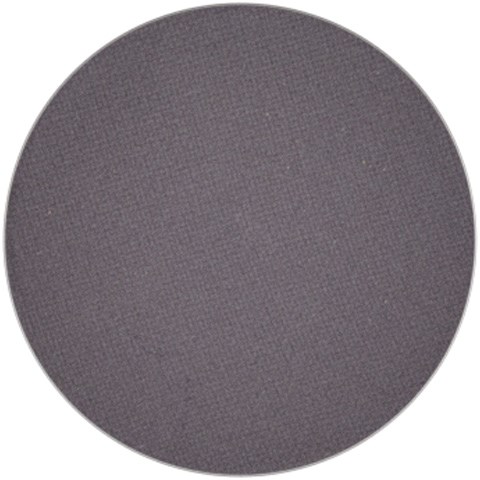 A gray round object with a textured surface, possibly a button or a piece of fabric.